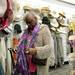 Ann Arbor resident Joyce Hunter tries on a scarf at Nordstrom Rack on Tuesday, April 16. AnnArbor.com I Daniel Brenner